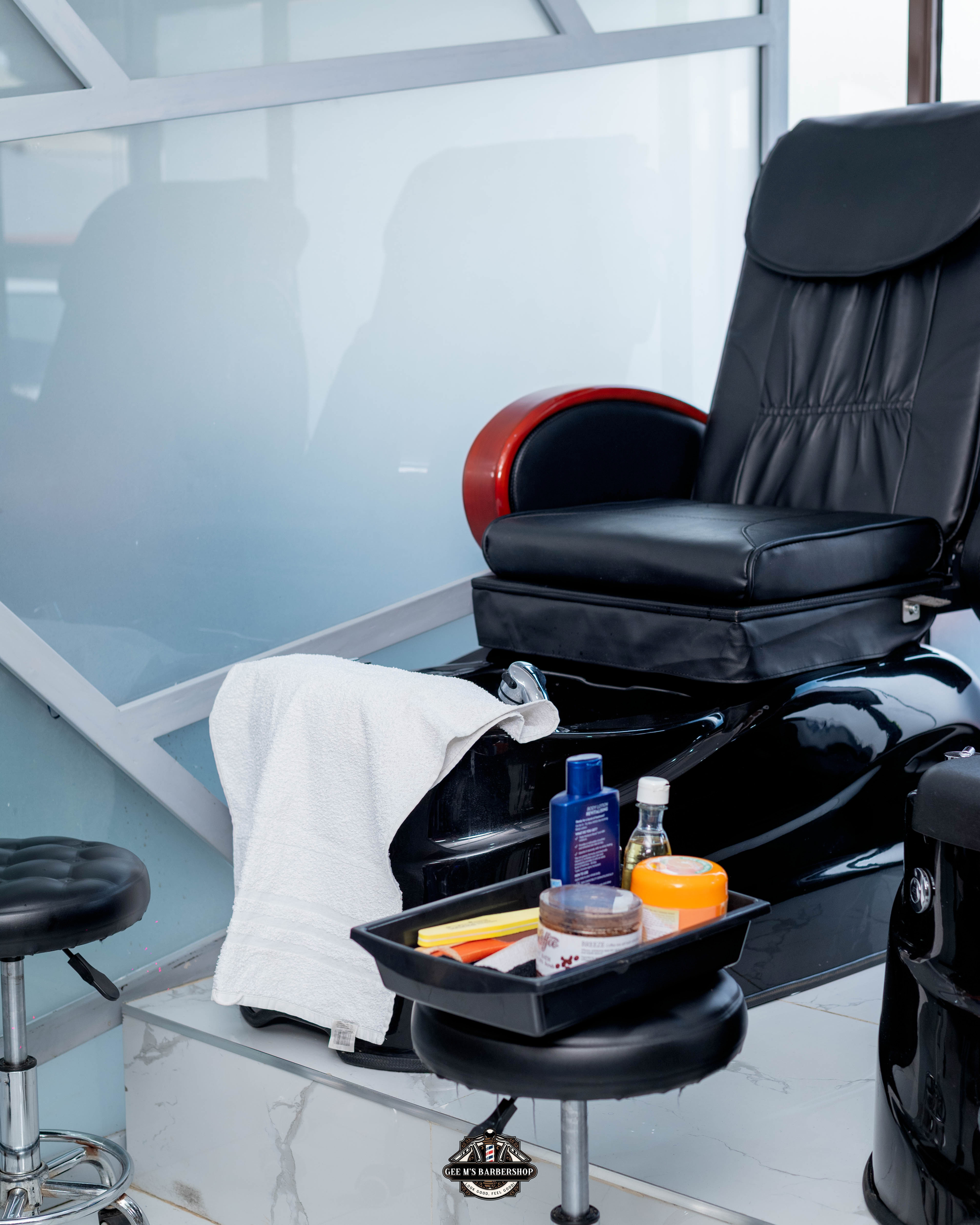 A pedicure in progress at GEE M'S Barbershop